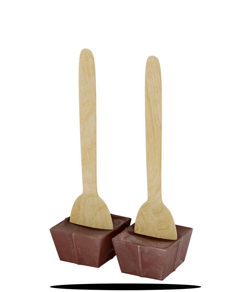 Twin plant-based hot chocolate spoons on a white background